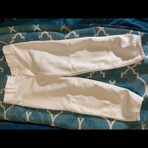 White Mizuno softball pants